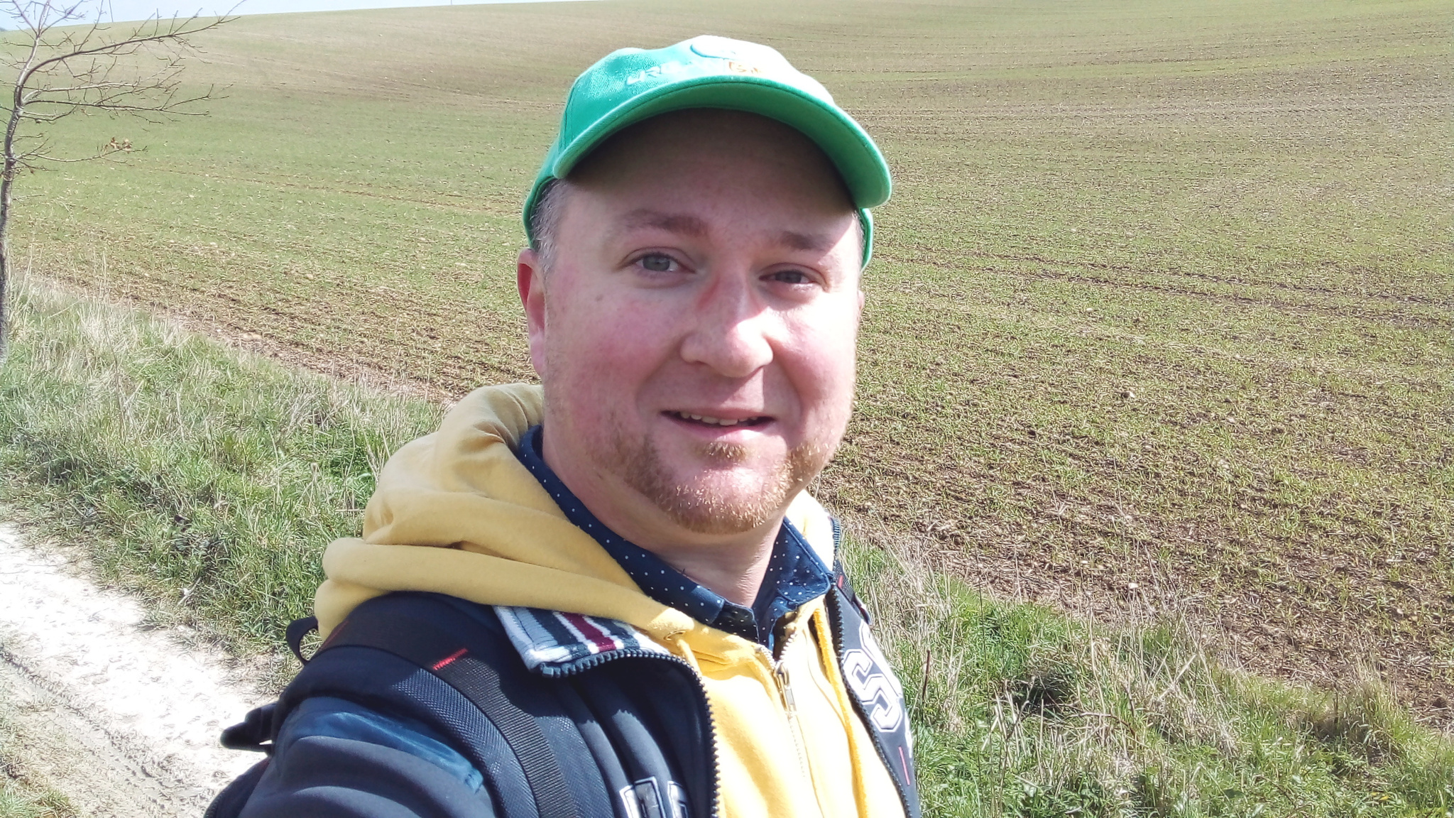A happy rambler in the fields.
