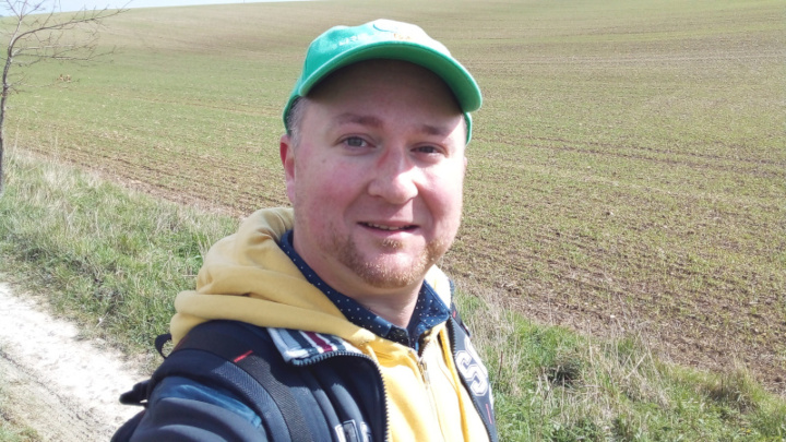 A happy rambler in the fields.