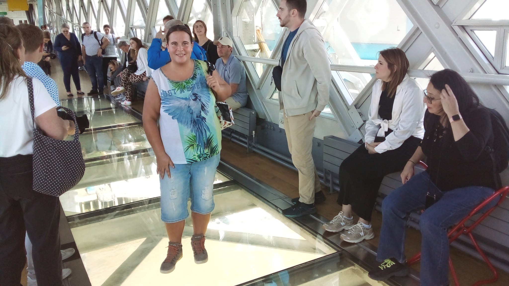 On the glass floor of one of the high-level walkways.