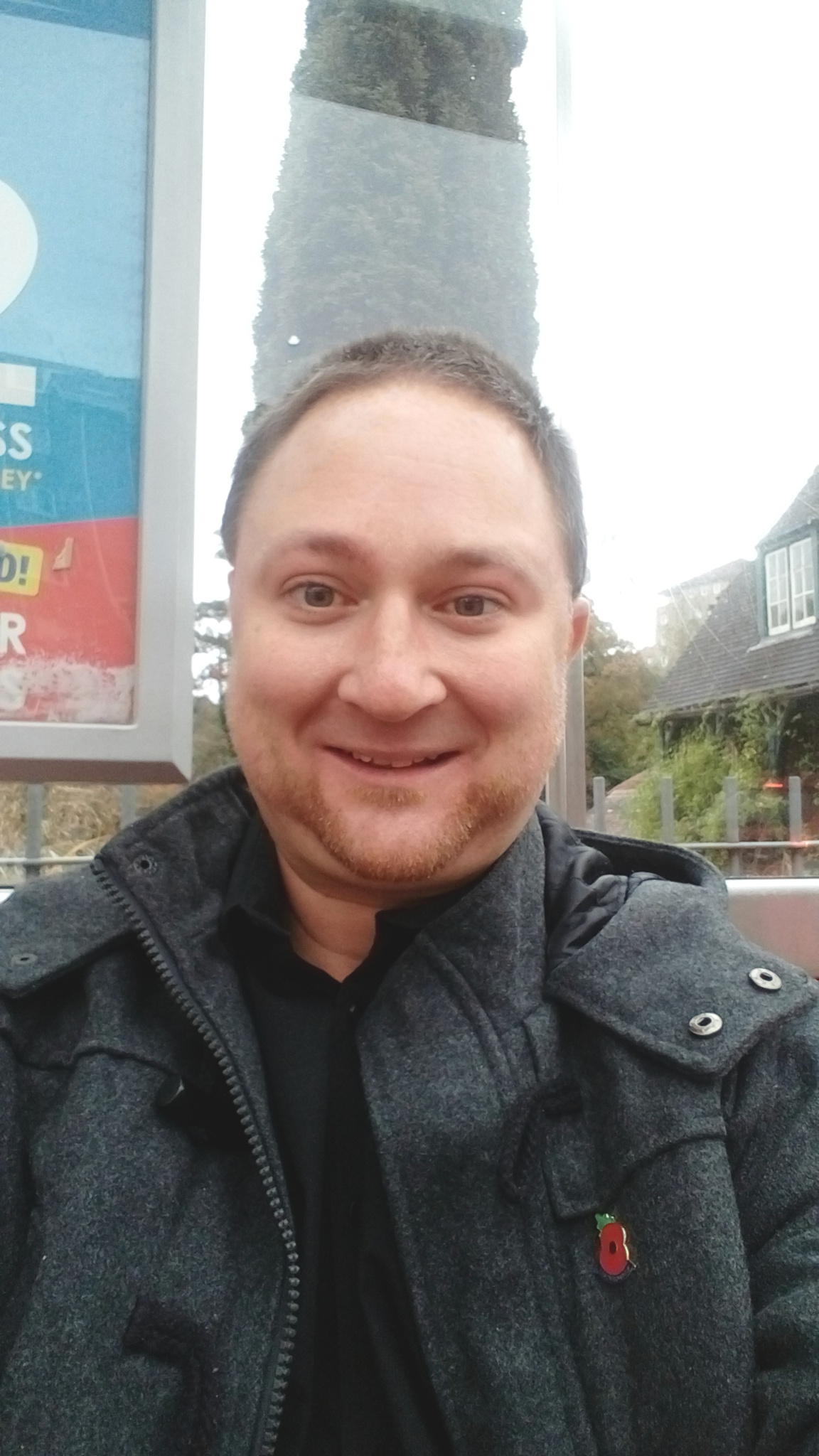 At the bus stop to the town centre.