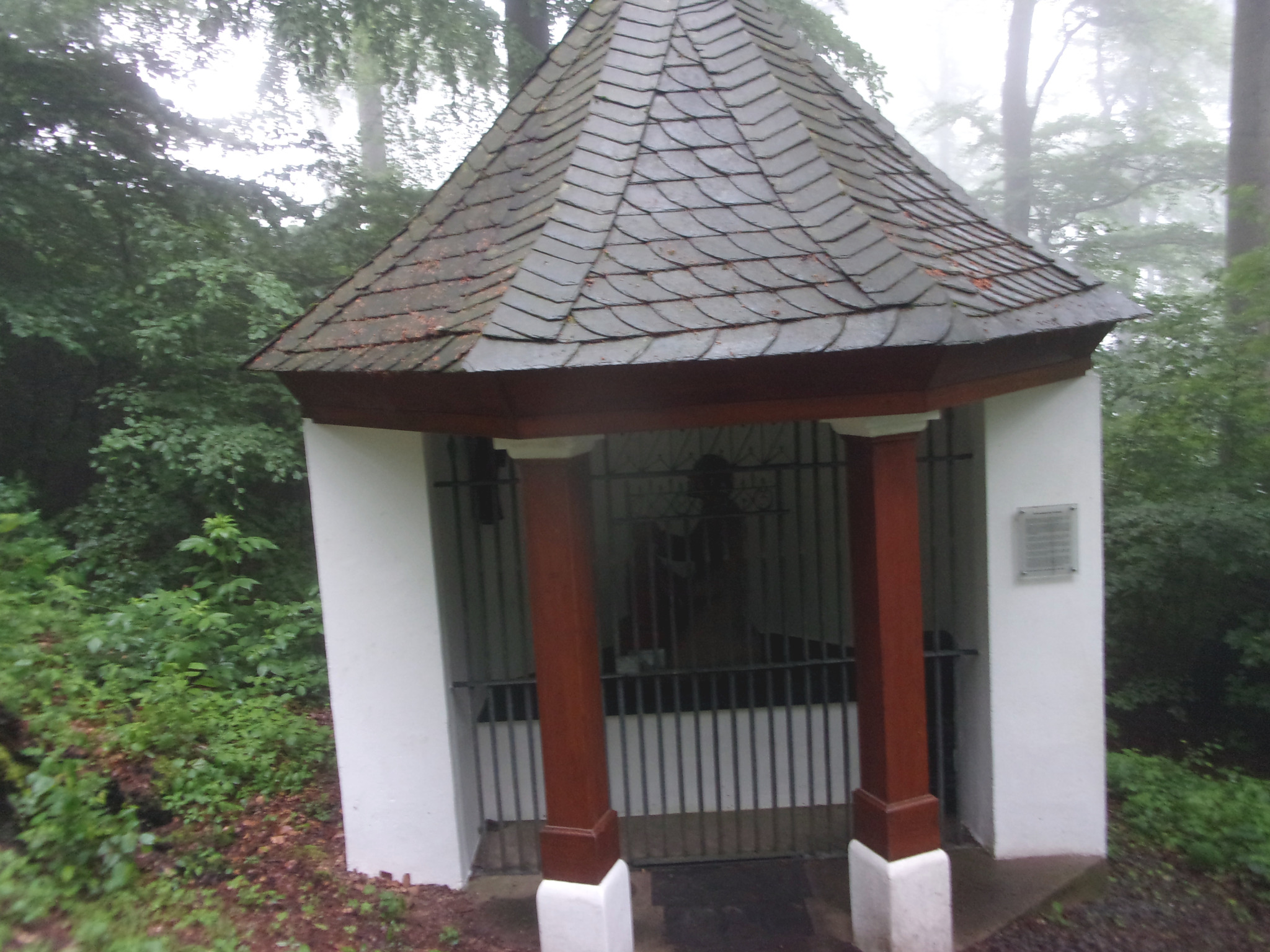 The figure inside the wayside shrine is called ‘Blood-Sweating Saviour’.