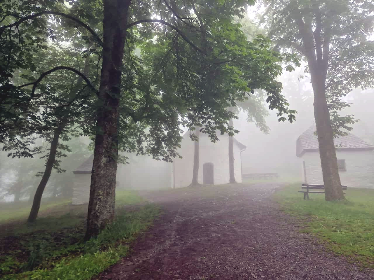 St Mary’s Chapel and wayside shrines in the mist on top of the mountain.