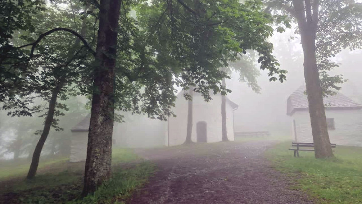 St Mary’s Chapel and wayside shrines in the mist on top of the mountain.